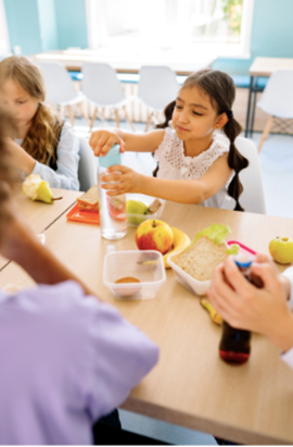 Children having lunch at a table